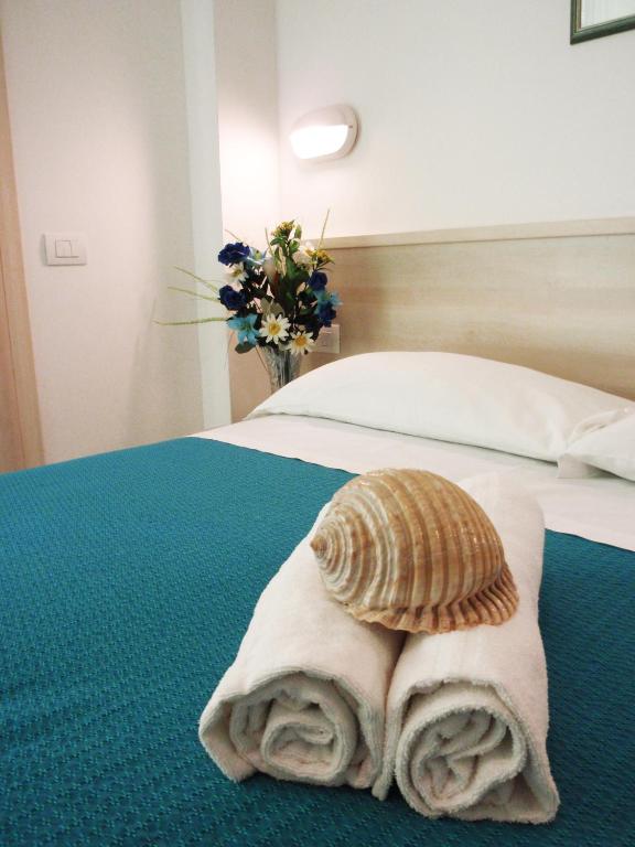 Postel nebo postele na pokoji v ubytování Hotel Lara
