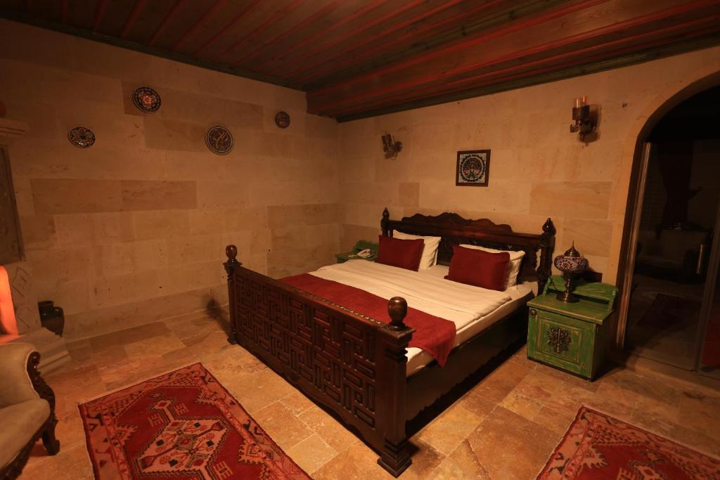 Postel nebo postele na pokoji v ubytování Katapa Stone House