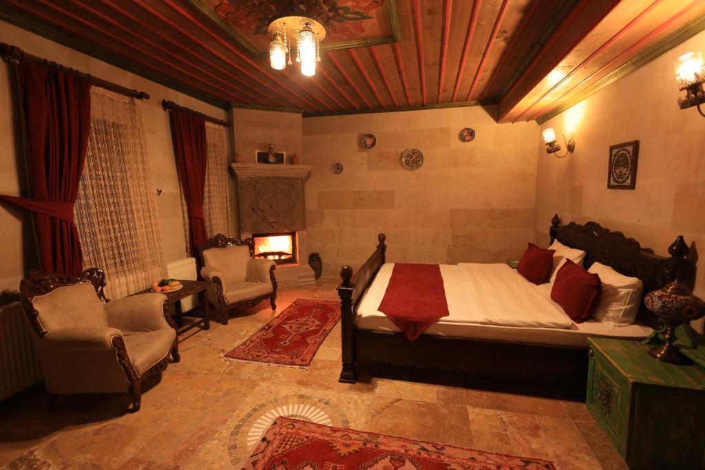 Postel nebo postele na pokoji v ubytování Katapa Stone House