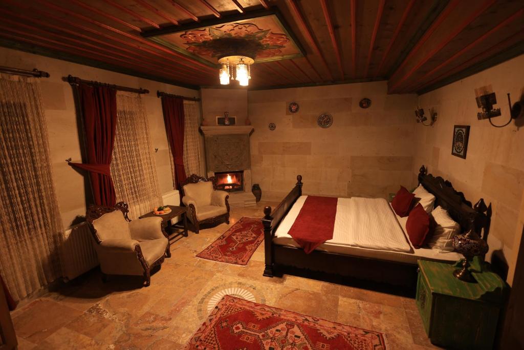 Postel nebo postele na pokoji v ubytování Katapa Stone House