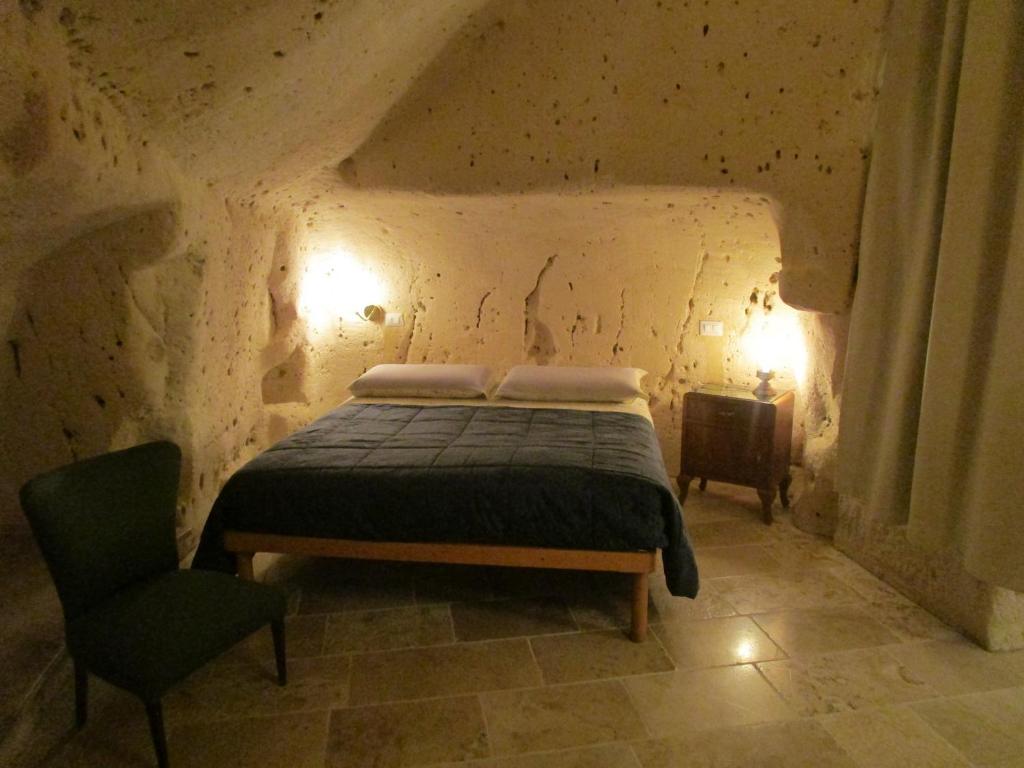 Postel nebo postele na pokoji v ubytování Casa Vetere