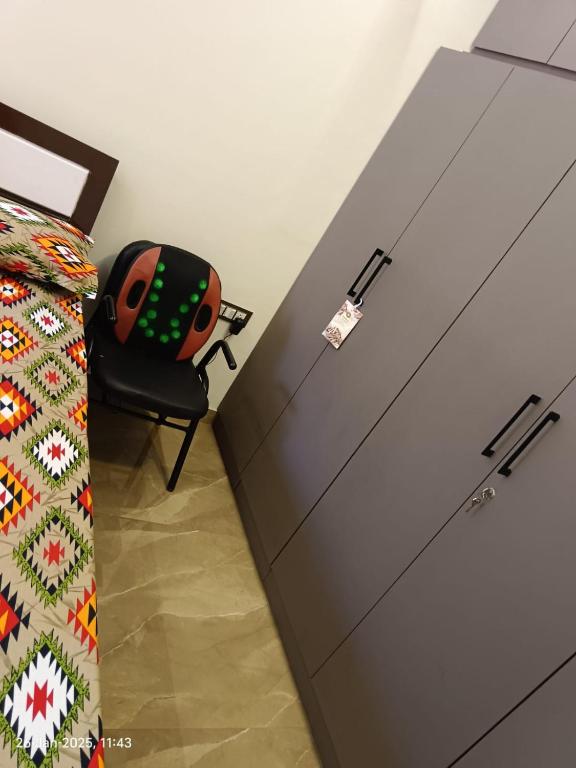 Postel nebo postele na pokoji v ubytování Om Nivas