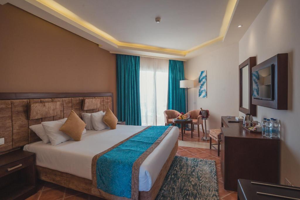 Postel nebo postele na pokoji v ubytování Ivy Cyrene Sharm Resort Adults Friendly Plus 13