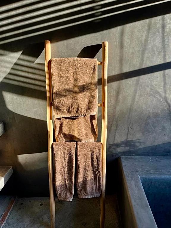 Postel nebo postele na pokoji v ubytování Manzil La Tortue