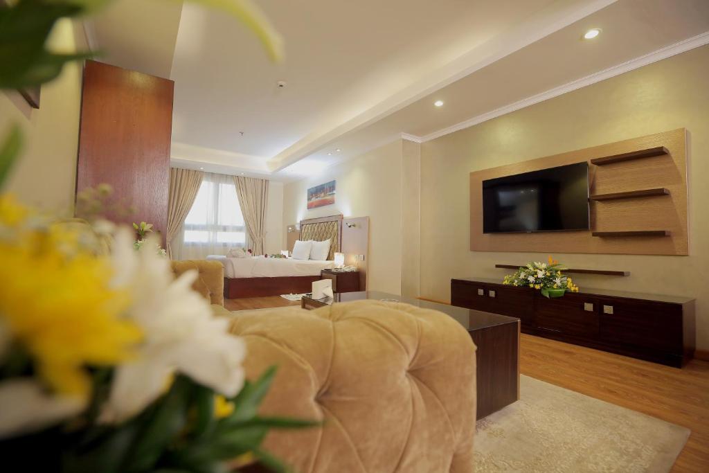 TV a/nebo společenská místnost v ubytování Cairo Taj Hotels & Suites - Dokki