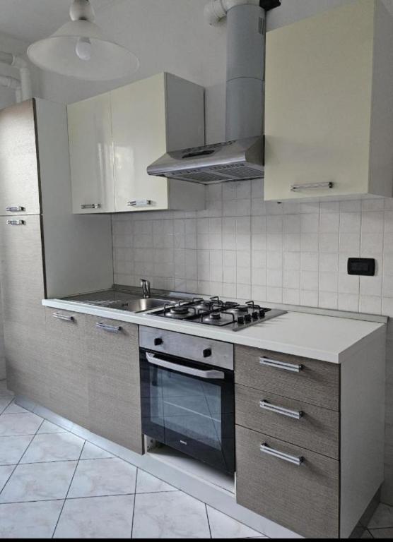 Kuchyň nebo kuchyňský kout v ubytování Agrati Residence