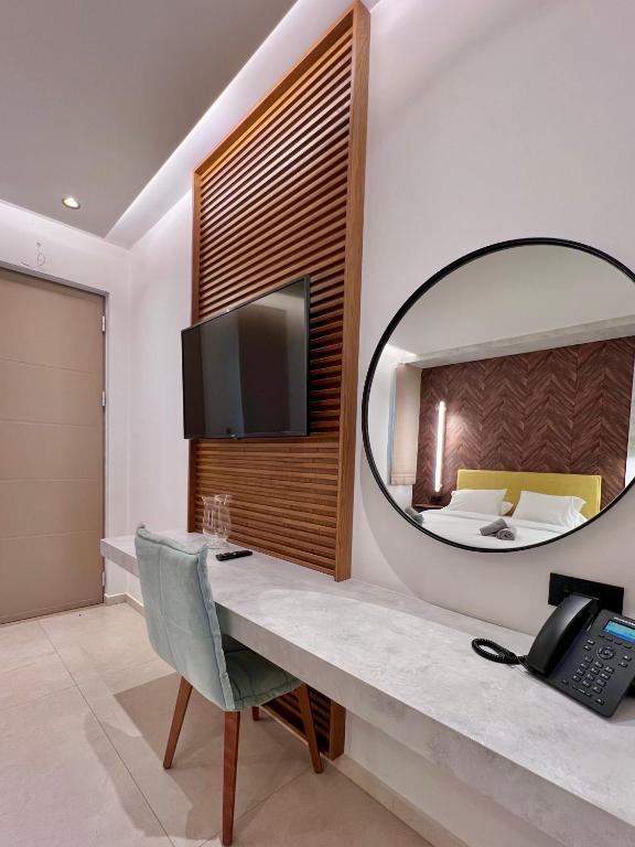 TV a/nebo společenská místnost v ubytování Anaxo Resort