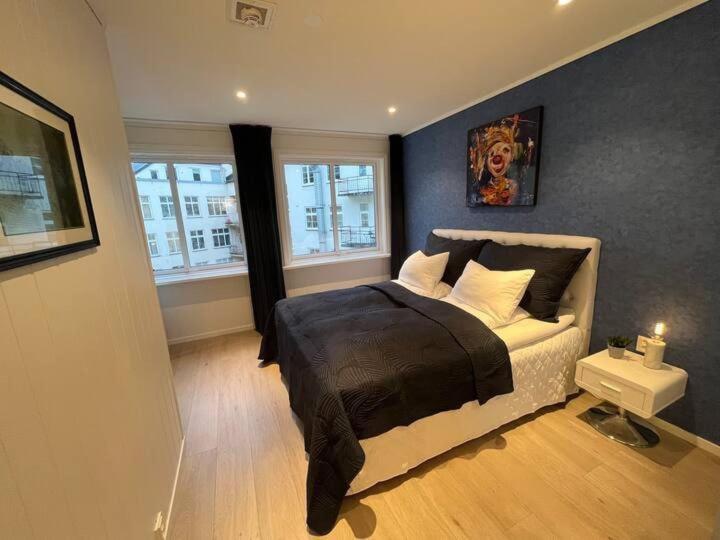 Ένα ή περισσότερα κρεβάτια σε δωμάτιο στο Apartment by Torgalmenningen