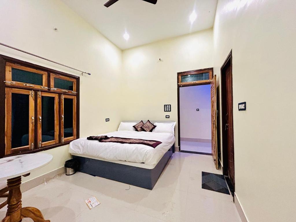 Giường trong phòng chung tại Hotel Central