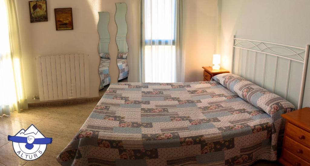 Postel nebo postele na pokoji v ubytování Altur 5 Jaca