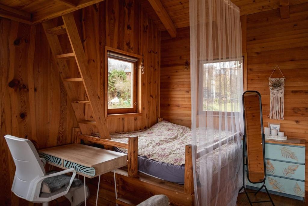 Postel nebo postele na pokoji v ubytování Druhanov Cottage