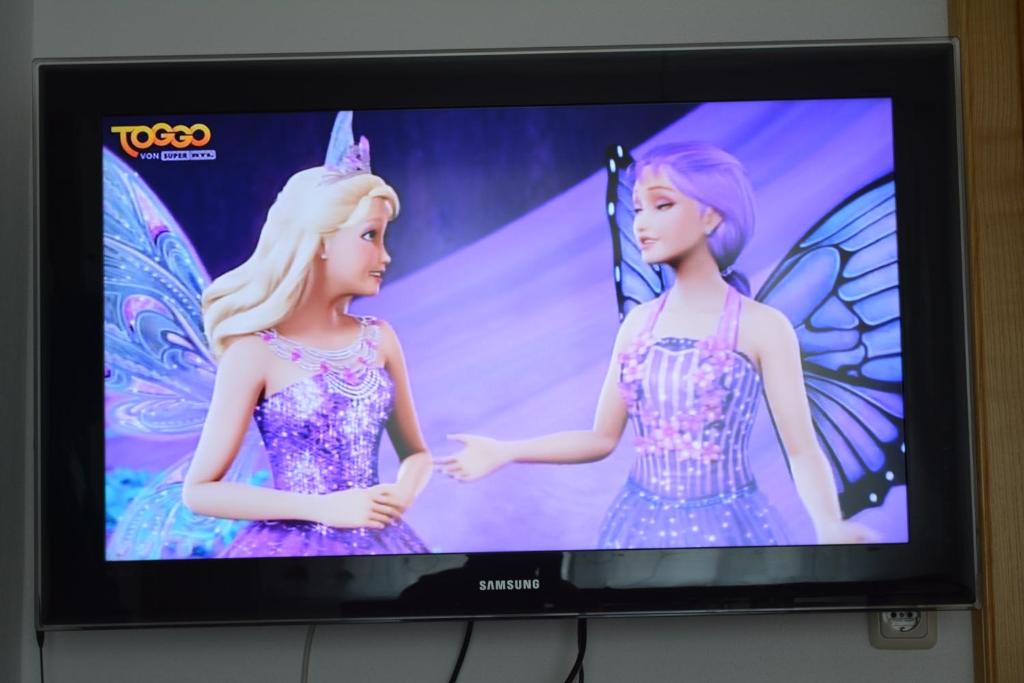 TV a/nebo společenská místnost v ubytování Gästehaus Huber