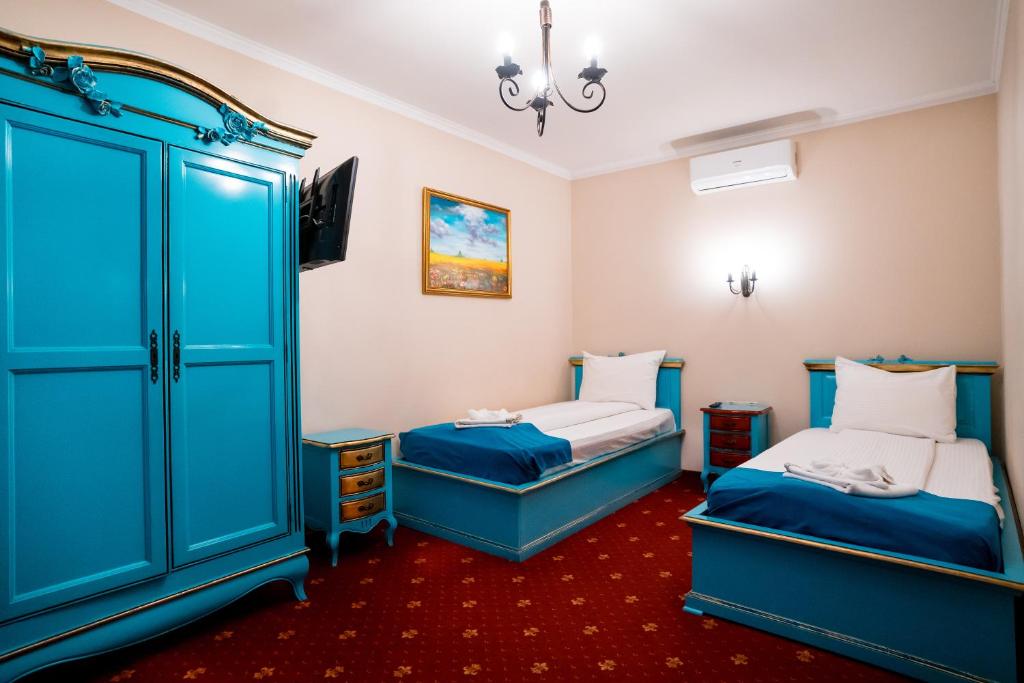 Postel nebo postele na pokoji v ubytování Rosen Villa Sibiu