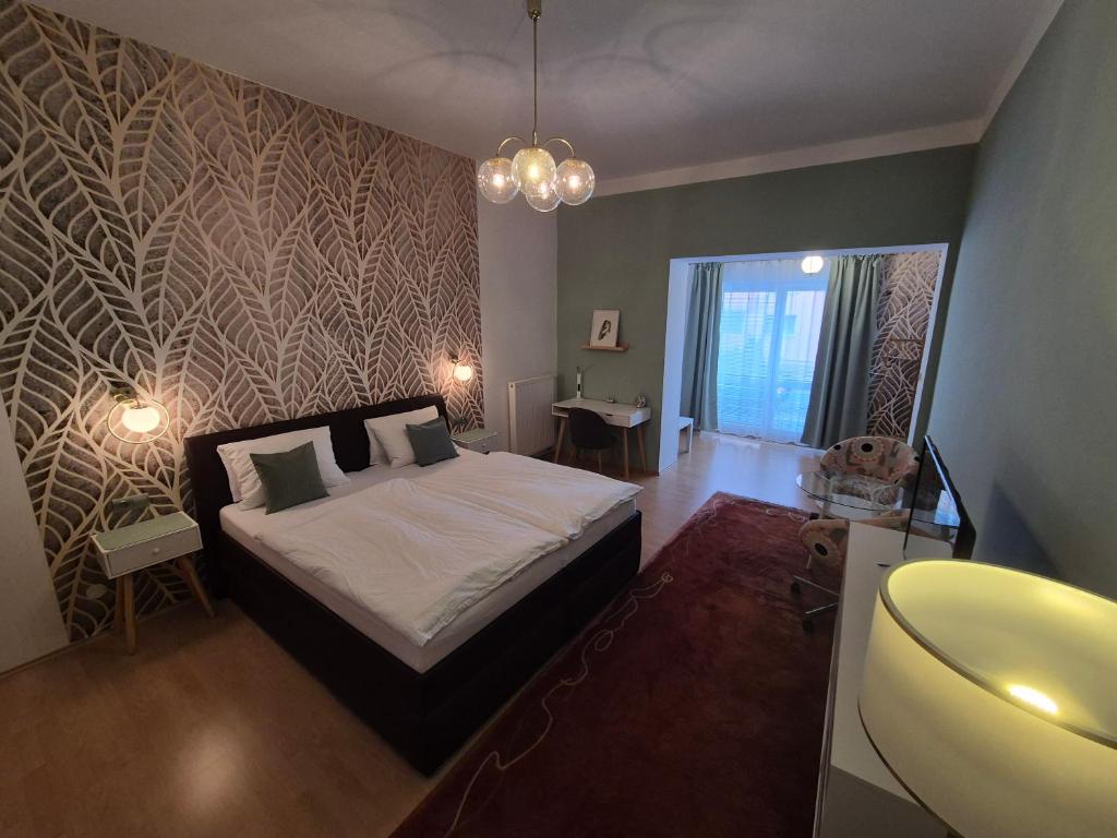 Postel nebo postele na pokoji v ubytování Penzion PIANO & Apartment Sokolov