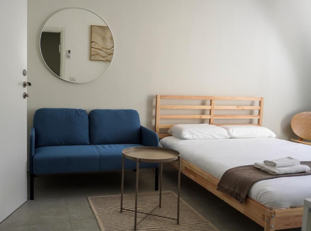 Voodi või voodid majutusasutuse Loveinsky Tel Aviv rooms toas