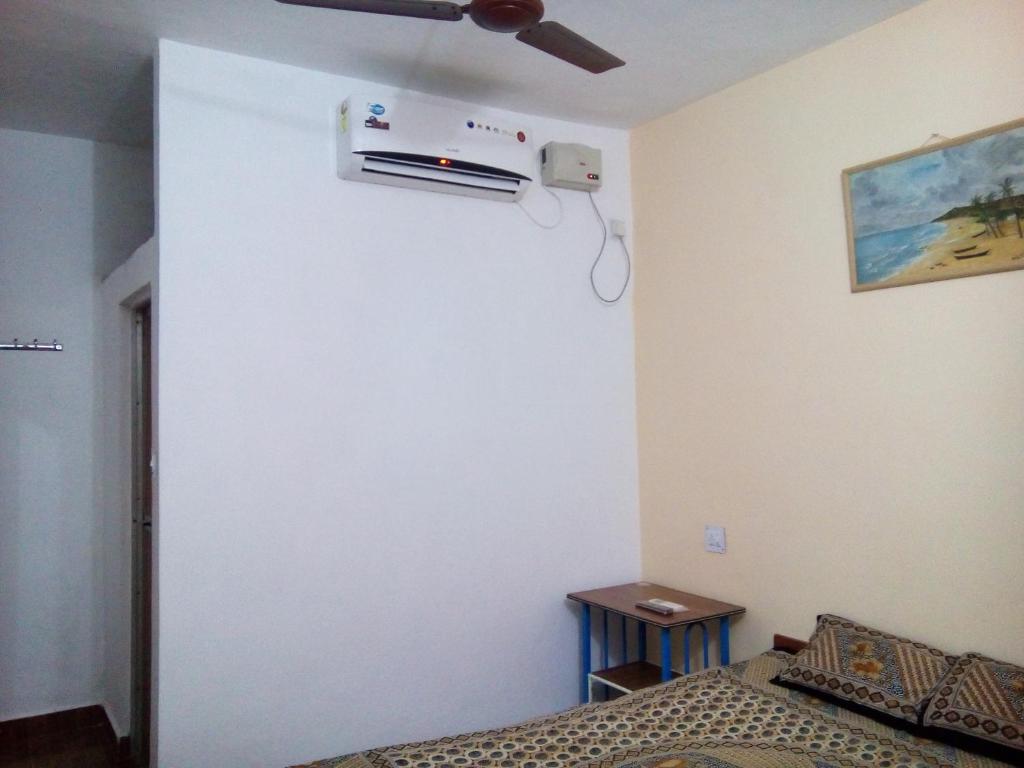 Postel nebo postele na pokoji v ubytování Adilson Guest House