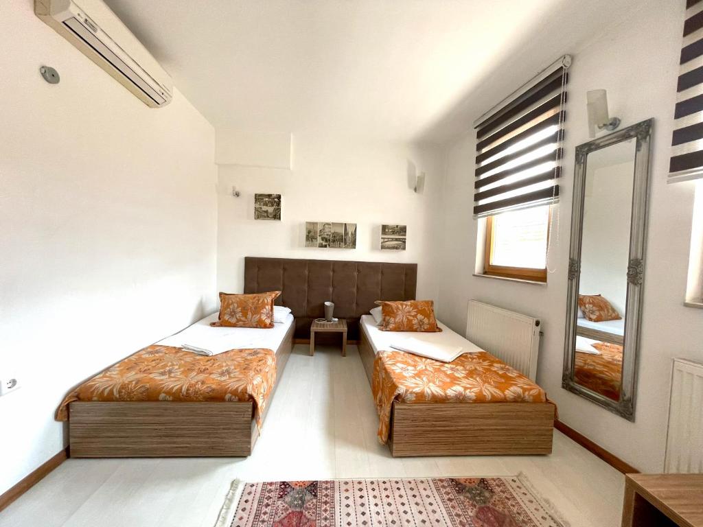 Postel nebo postele na pokoji v ubytování Hotel Kovači