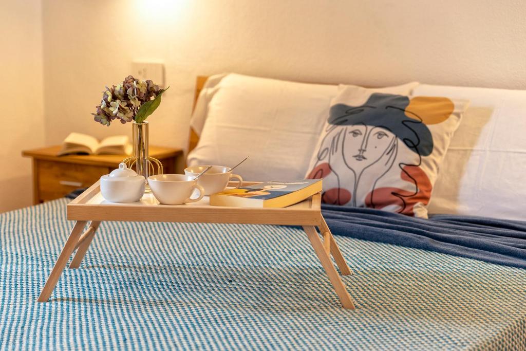 En eller flere senge i et værelse på Luxury House San Teodoro Center