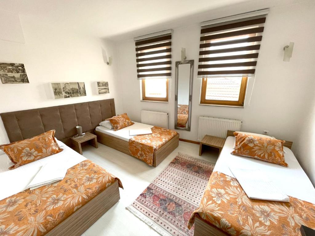 Postel nebo postele na pokoji v ubytování Hotel Kovači