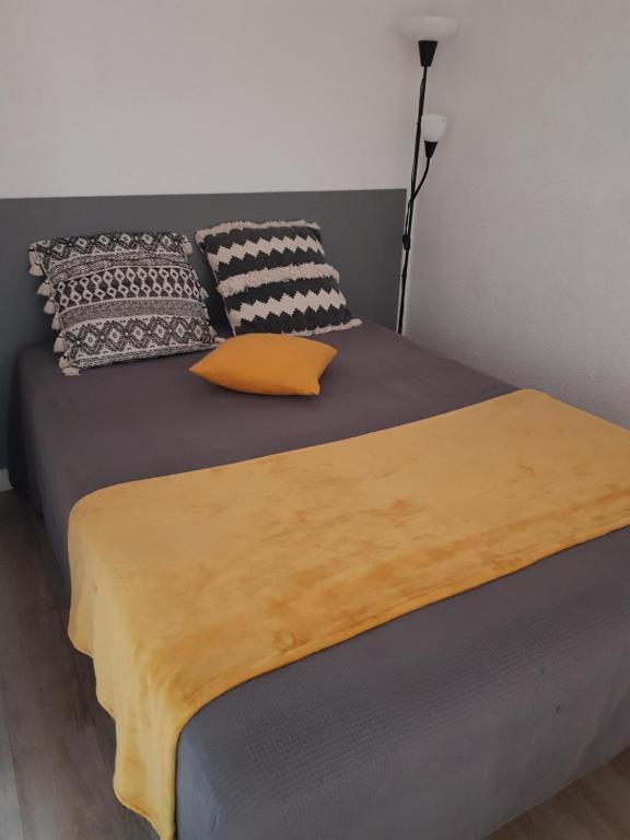 Posteľ alebo postele v izbe v ubytovaní MARSEILLAN-PLAGE Appartement Coeur de sable