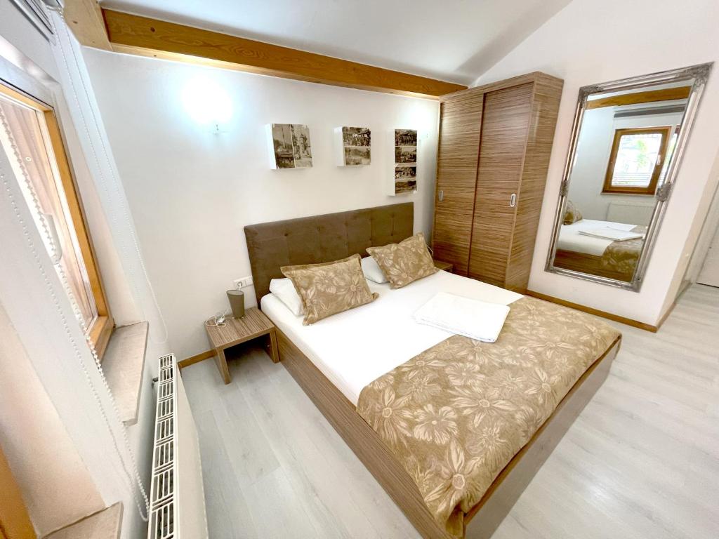 Postel nebo postele na pokoji v ubytování Hotel Kovači