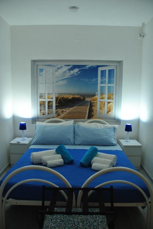 A bed or beds in a room at Casa Vacanze Casti - 41
