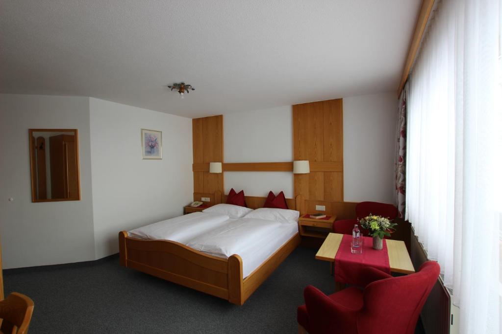 Postel nebo postele na pokoji v ubytování Hotel Garni Bel-Ami