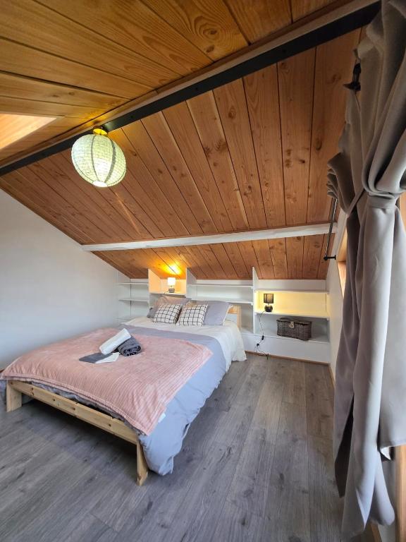 Postel nebo postele na pokoji v ubytování Évasion en Normandie