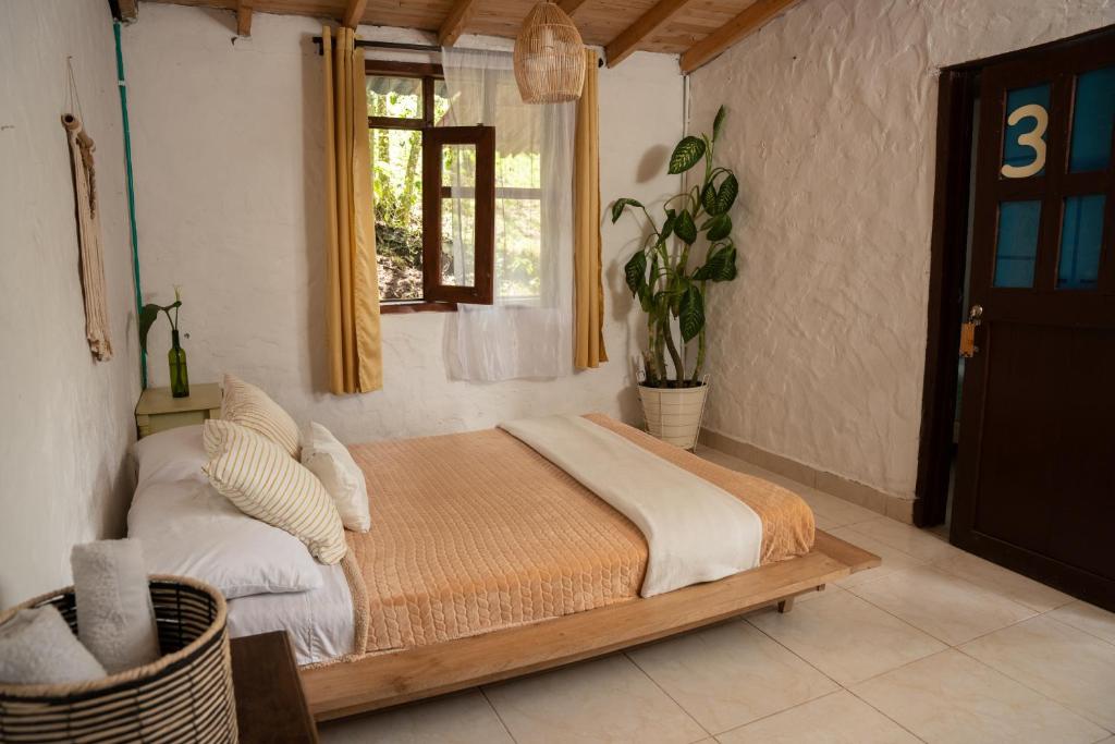 Postel nebo postele na pokoji v ubytování Casa Profunda - Santa Elena