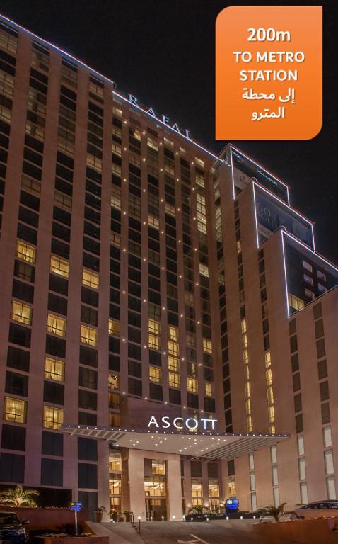 a large building with a sign in front of it at Ascott Rafal Olaya Riyadh in Riyadh