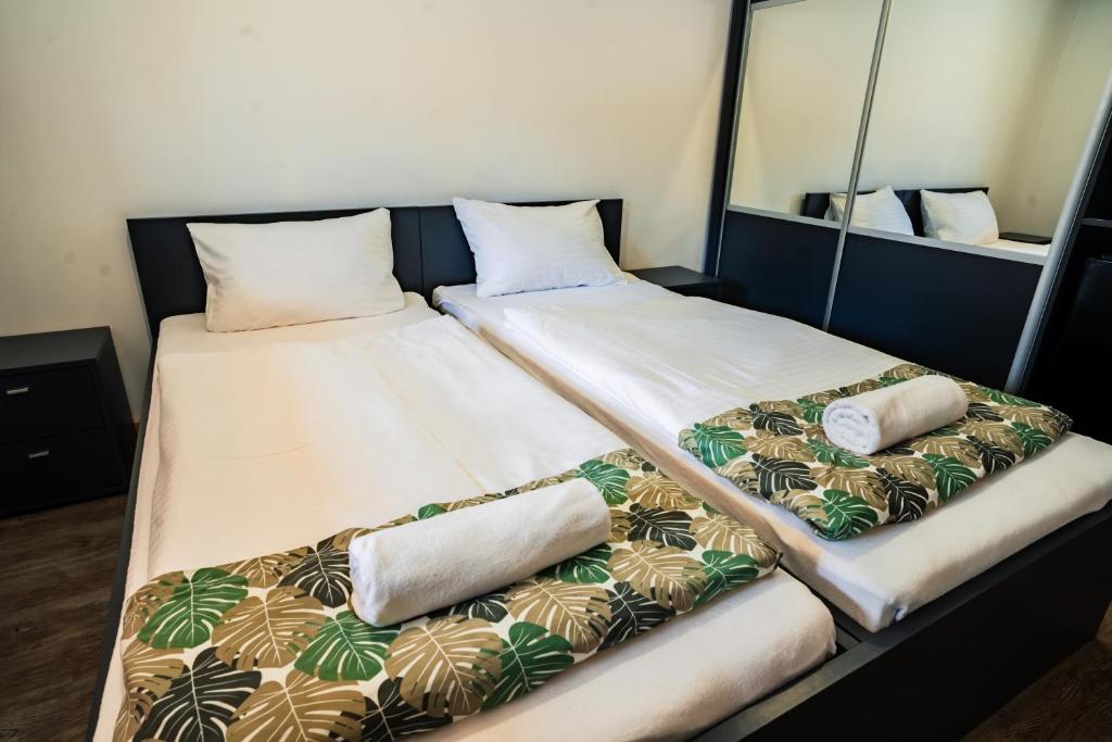 Postel nebo postele na pokoji v ubytování Siocamping Házak Homes