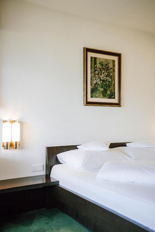 Postel nebo postele na pokoji v ubytování Hotel Montjola Nova