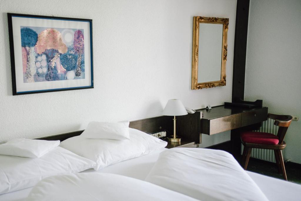 Postel nebo postele na pokoji v ubytování Hotel Montjola Nova