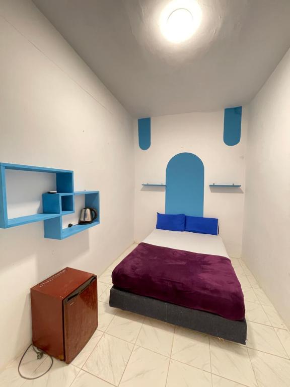 Postel nebo postele na pokoji v ubytování whales camp dahab
