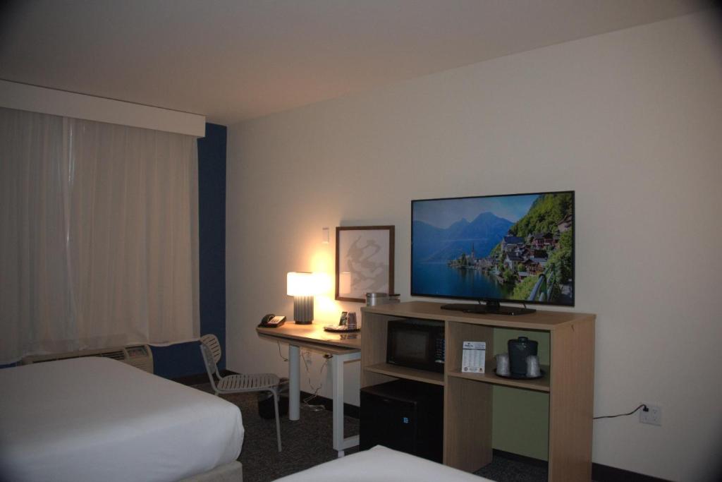 Postel nebo postele na pokoji v ubytování Spark by Hilton Amarillo East
