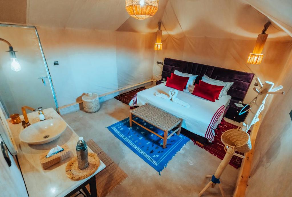 Postel nebo postele na pokoji v ubytování Kidal Camp