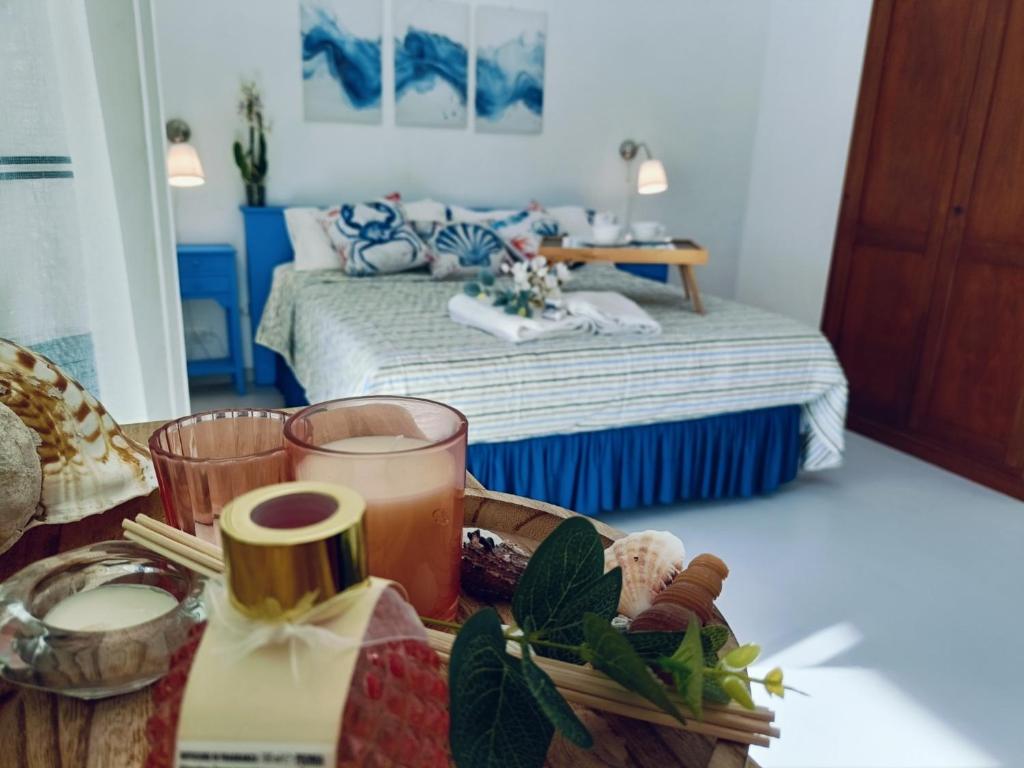 Łóżko lub łóżka w pokoju w obiekcie Casa Eolie relax