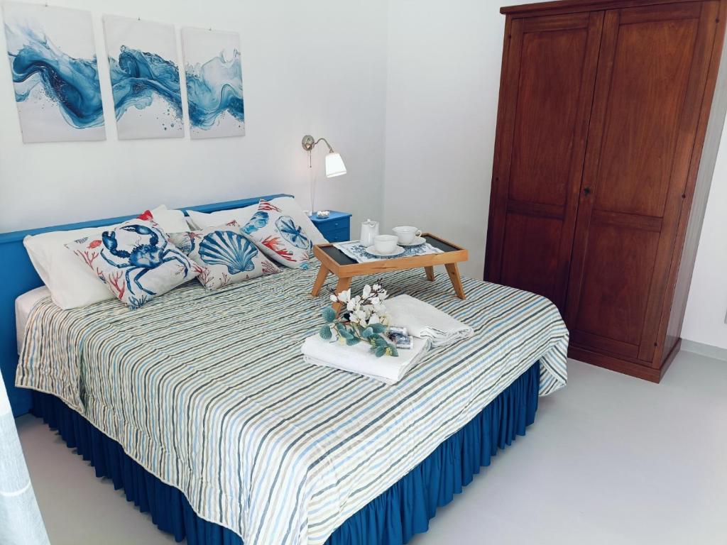 Łóżko lub łóżka w pokoju w obiekcie Casa Eolie relax