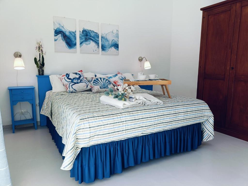 Łóżko lub łóżka w pokoju w obiekcie Casa Eolie relax