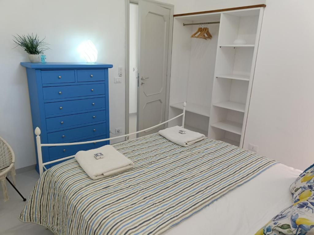 Łóżko lub łóżka w pokoju w obiekcie Casa Eolie relax
