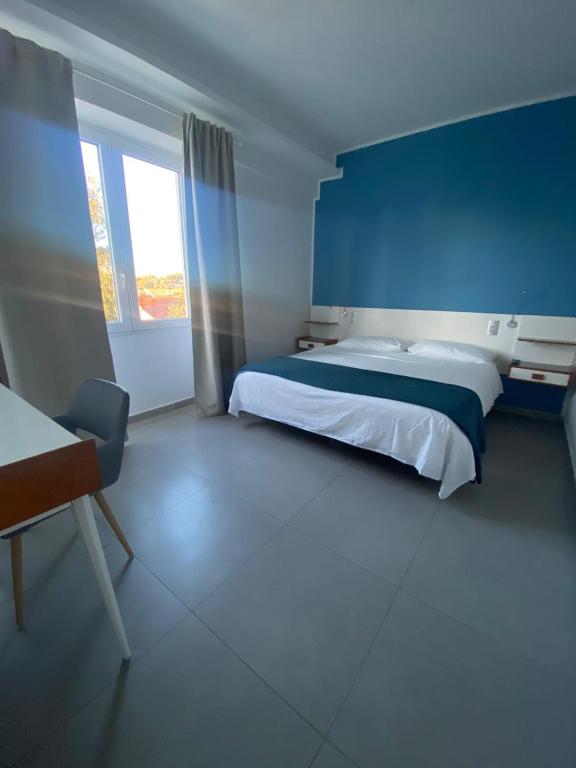Postel nebo postele na pokoji v ubytování Golden Beach Residence