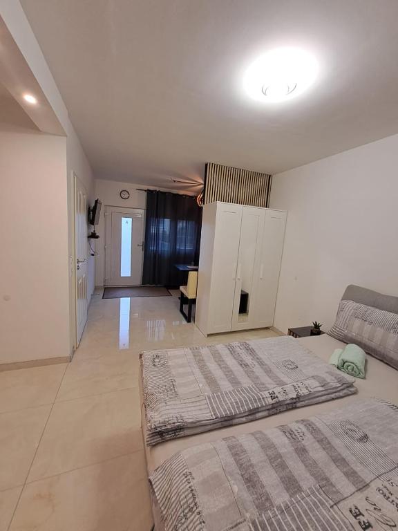 a large room with two beds and a couch at Ferienwohnung Selo A in Coppenbrügge