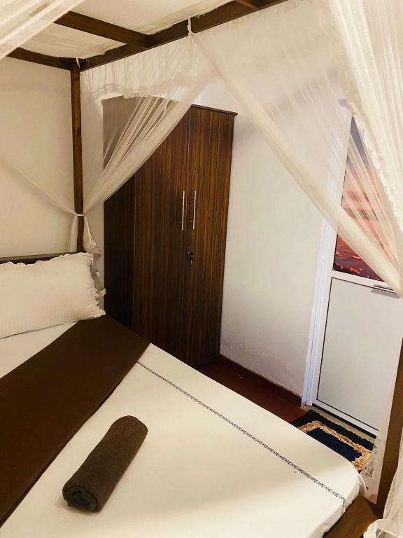 Postel nebo postele na pokoji v ubytování Perfect Home Mirissa