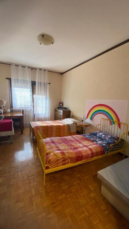 Postel nebo postele na pokoji v ubytování Appartamento alle porte d'Ivrea