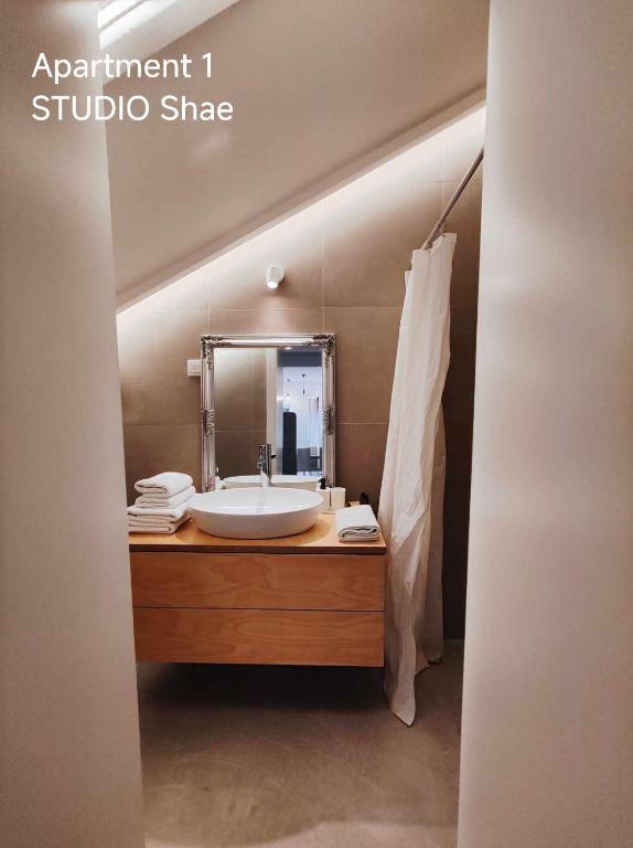Postel nebo postele na pokoji v ubytování Pekarna apartments