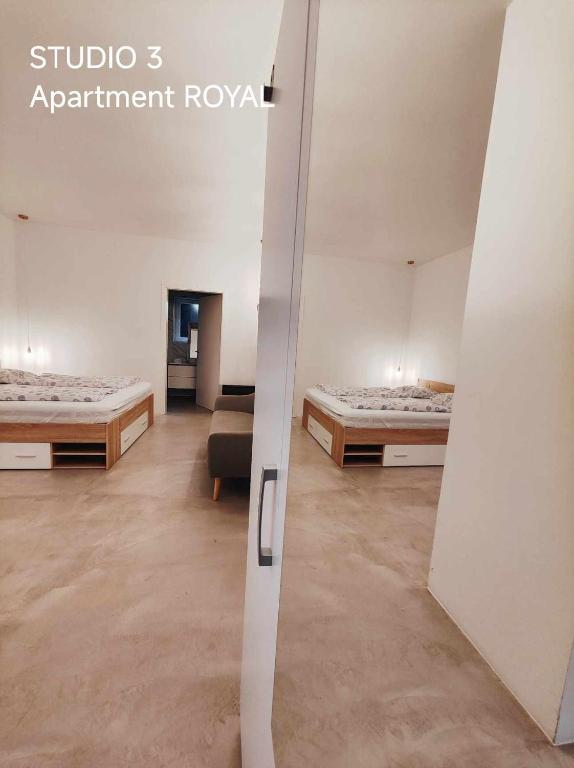 Postel nebo postele na pokoji v ubytování Pekarna apartments