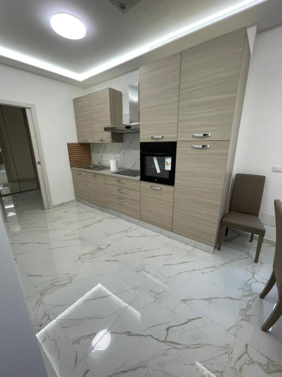 Kuchyň nebo kuchyňský kout v ubytování Appartamento Smart