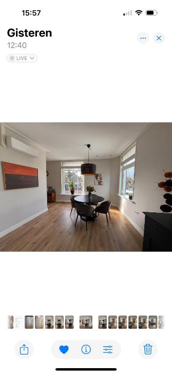a picture of a living room with a table at Prachtig en ruim appartement in centrum Lochem in Lochem