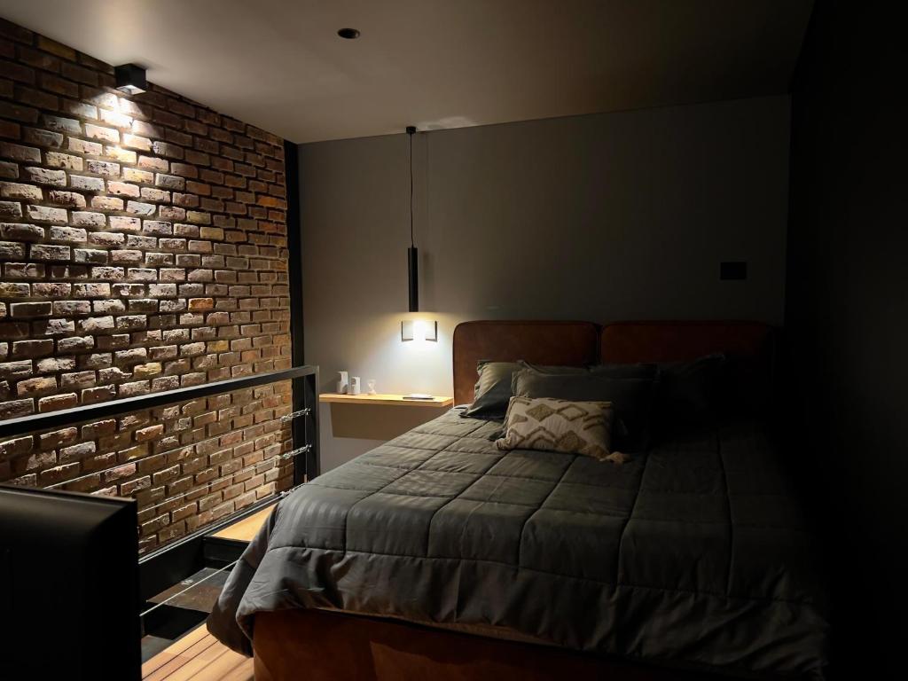 Postel nebo postele na pokoji v ubytování Blok Living