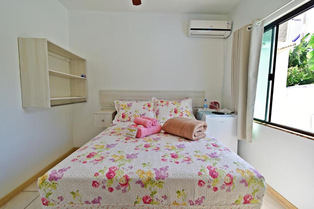 Cama ou camas em um quarto em Pousada Enseada dos Golfinhos